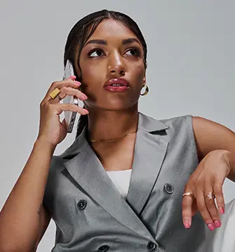 Woman on the phone, representing a first conversation with our team